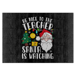 Tabla De Cortar Sé Amable Con El Profesor Santa Está Observando Pr