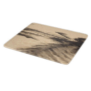 Tabla De Cortar Sombras en la arena