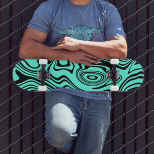 Tablas de skate con rayas onduladas en verde azula