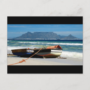 Table Mountain con postales de barcos pesqueros
