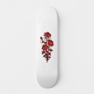 Tablero de patineta de rosa roja grunge desgastada