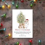 Tan Corgi y el perro Mascota del árbol de Navidad<br><div class="desc">Esta adorable tarjeta de Navidades con temática de corgi incluye un corgi blanco y bronceado con un sombrero de Papá Noel sentado frente a un árbol de Navidad iluminado. El saludo en la tarjeta dice "Feliz Navidad" "Que todo lo que sea hermoso y te trae alegría sea tuya esta temporada...</div>