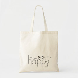 Tan feliz mano con la bolsa de té