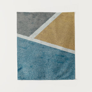 Tapiz Adosado pintado de gris, amarillo y azul