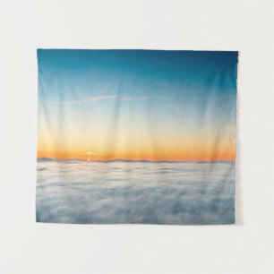Tapiz Amanecer mágico sobre las nubes