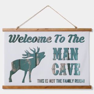 TAPIZ CON MARCO DE MADERA BIENVENIDOS AL HOMBRE CAVE
