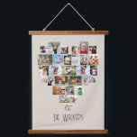Tapiz Con Marco De Madera Nombre de la familia Collage de fotos con forma de<br><div class="desc">Pantalla de fotos personalizado en una gran pared colgada, personalizada con el nombre de su familia. La plantilla de fotos muestra las imágenes en un collage de fotos en forma de corazón que contiene 29 imágenes. Sus fotos se muestran en una combinación de formatos cuadrados, paisajísticos y retratos y, si...</div>