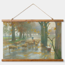 Rebaño de ovejas con pastora en un día lluvioso