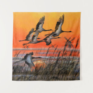 Tapiz de aves de atardecer volando