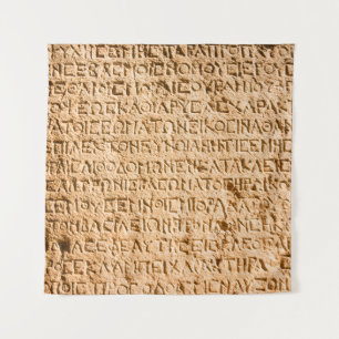 Tapiz escritura griega antigua cincelada en piedra