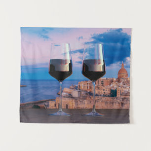 Tapiz Gafas de vino con vistas a la puesta de sol sobre