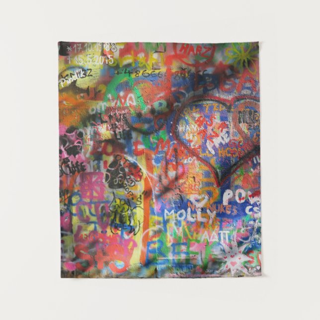 Tapiz Graffiti multicolor en una pared de hormigón (Anverso)
