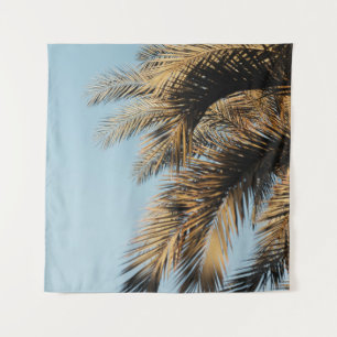 Tapiz Palmera verde bajo cielo azul por la mañana