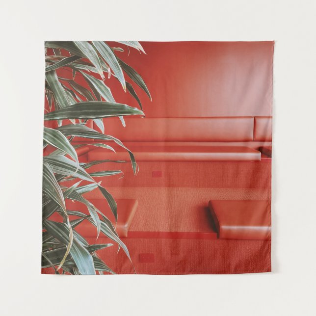 Tapiz Planta verde sobre sofá rojo (Anverso)