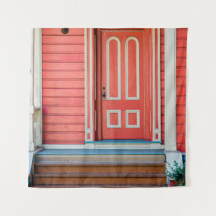 Tapiz Traditional red painted wooden door and porchdoor,