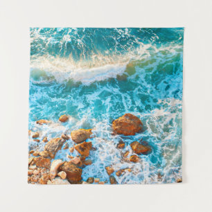 Tapiz Waves on a rocky beach at sunset. Aerial viewbeach