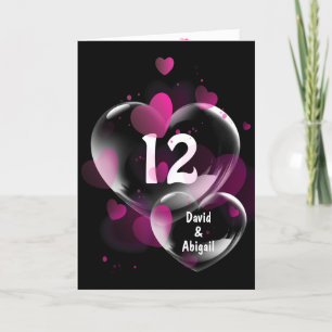 Tarjeta 12° aniversario burbujas de corazón en negro