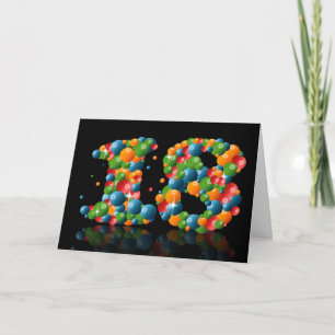 Tarjeta 18 años con números formados de bolas