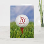 Tarjeta 70th Birthday Golf Ball<br><div class="desc">Close up of a white golf ball on a red tee in grass with sky background for 70th birthday.</div>