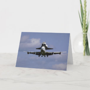 Tarjeta 747 y lanzadera que llegan, aire del International