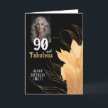 Tarjeta 90 y Fabulous Gold Foliage 90th Birthday Photo<br><div class="desc">Elegante 90 y fabulosa tarjeta fotográfica de cumpleaños 90. 90 y texto fabuloso en escritura blanca a la moda con un nombre y follaje dorado sobre un fondo negro. Personalízalo con tu foto,  tu nombre y la edad. Agrega tu texto dentro de la tarjeta o borra.</div>