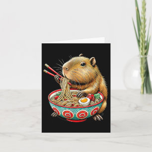 Tarjeta A Capybara le encanta el fideo, el capibara come e