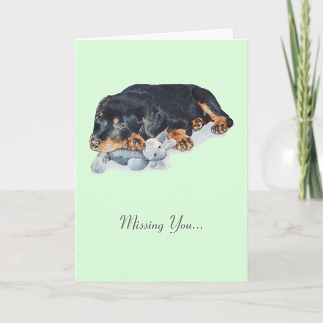 Tarjeta adorable cachorro de rottweiler perro adormecido d (Anverso)