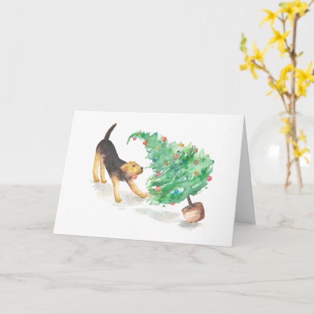 Tarjeta Airedale jalando el árbol de Navidad (flor amarilla)