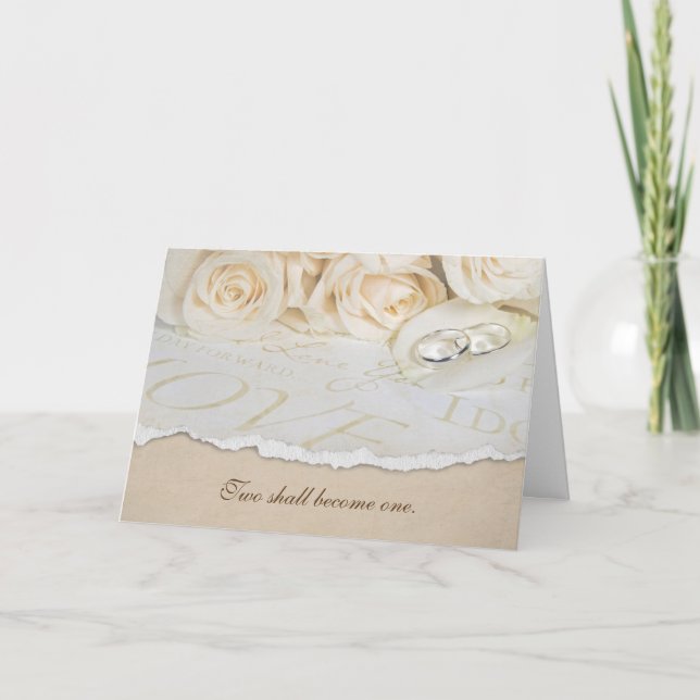 Tarjeta anillos de boda sobre pétalo rosa (Anverso)