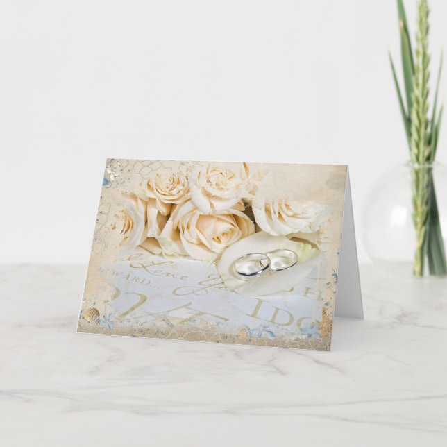 Tarjeta anillos de boda sobre pétalo rosa (Anverso)