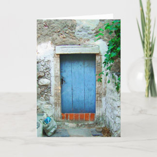 Tarjeta Antigua puerta azul de pueblo griego