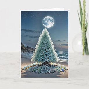 Tarjeta Árbol de Navidad de vidrio marino en una playa