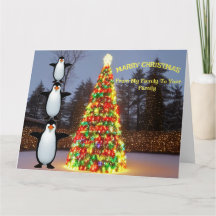 Árboles de Navidad y familia de pingüinos divertid