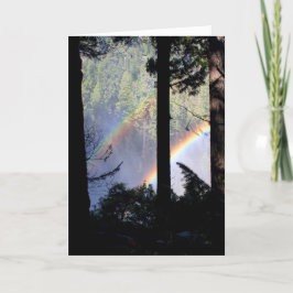 Tarjeta Arco iris doble a través de árboles