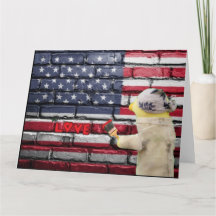 Arte de grafiti en muro de Amor a Estados Unidos.