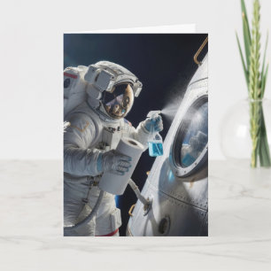 Tarjeta Astronauta de cumpleaños limpiando la ventana de l