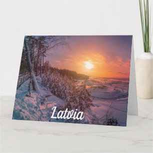 Tarjeta Atardecer sobre la nevada costa del mar