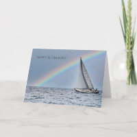 Barco de vela y retiro del arco iris