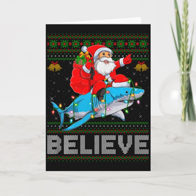 Tarjeta Believe Xmas Funny Santa Riding Shark Ugly Christm (Anverso)