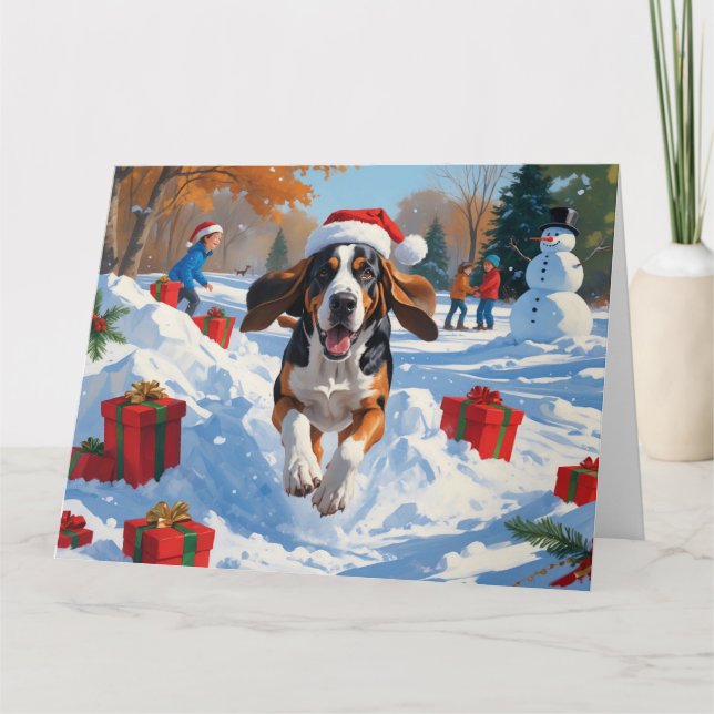 Tarjeta Bluetick Coonhound corriendo en la nieve con Navid (Anverso)
