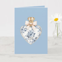 Botella de perfume de corazón floral blanco azul a