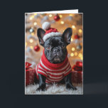 Tarjeta Bulldog francés navidad con Santa Hat<br><div class="desc">Un bulldog francés negro con un suéter rayado rojo y blanco se sienta sobre una alfombra de piel blanca. Se puede cambiar el texto.</div>