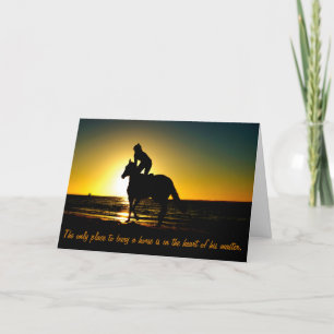 Tarjeta Caballo y jinete en la playa en la silueta de la