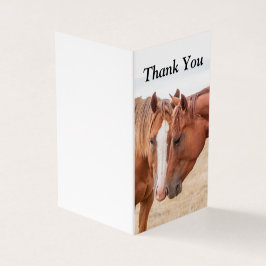 Tarjeta Caballos zumbando en un pasto