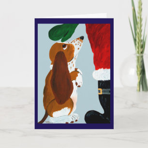 Tarjeta Cachorro Basset recibiendo una mascota de Santa