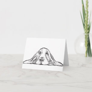 Tarjeta cachorro de ojos simples negro y blanco de basset