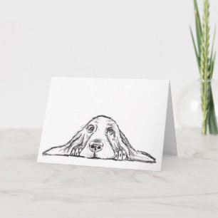 Tarjeta cachorro de ojos simples negro y blanco de basset