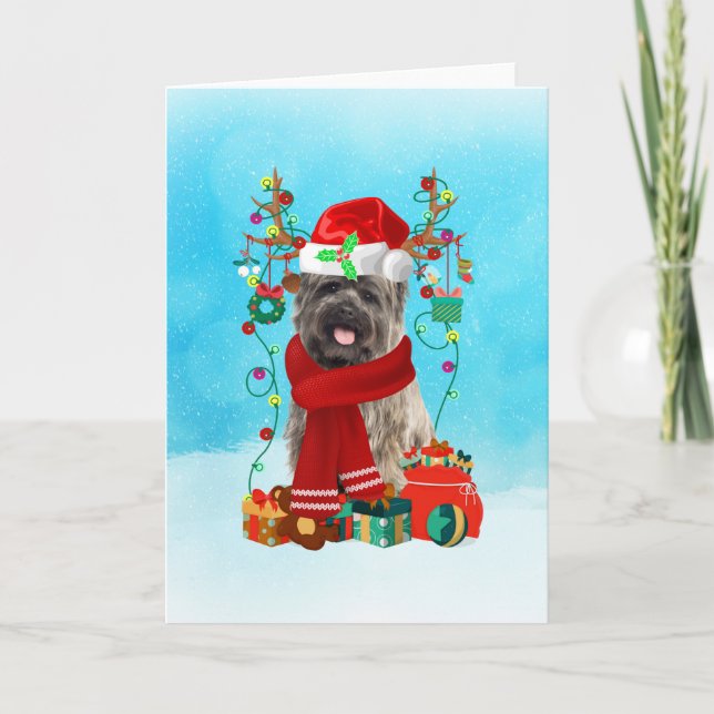 Tarjeta Cairn Terrier en la nieve con regalos de Navidades (Anverso)