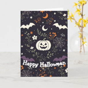 Tarjeta Calabaza de Halloween con flores púrpuras