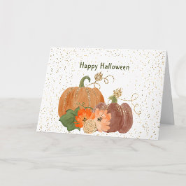 Tarjeta Calabazas naranjas de Halloween flores doradas